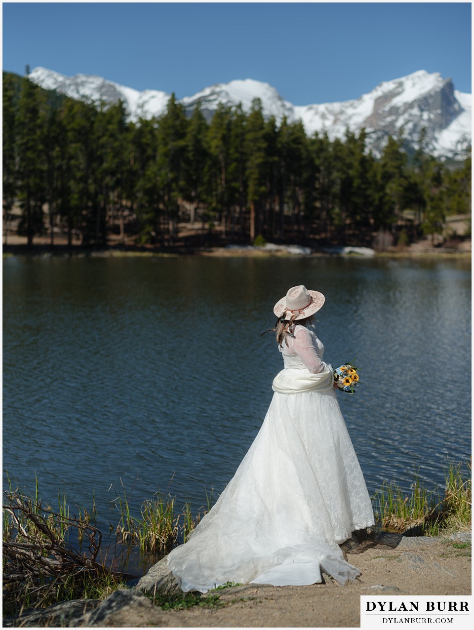 2nd chance at love rocky mountain elopement bride looking out over sprague lake