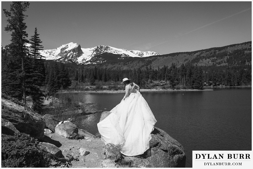 2nd chance at love rocky mountain elopement bride showing off dress at sprague lake