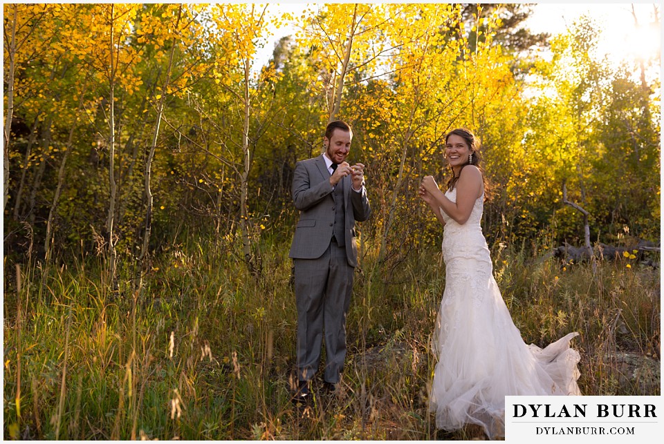 rocky mountain national park elopement wedding bride and groom playing a game