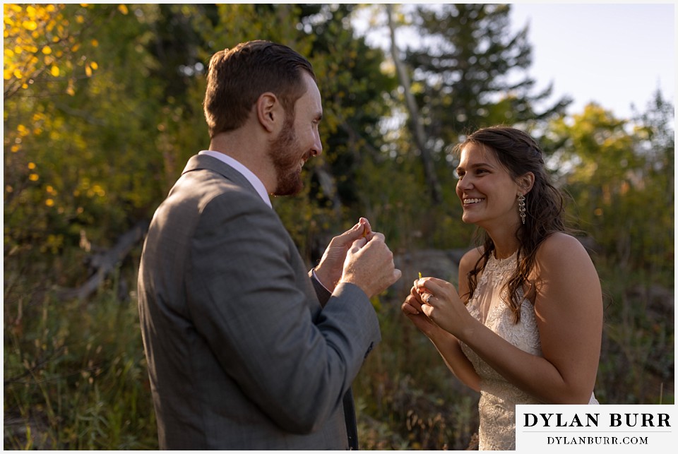 rocky mountain national park elopement wedding bride laughing with her husband