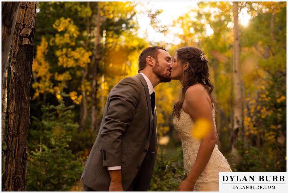 rocky mountain national park elopement wedding bride and groom kissing