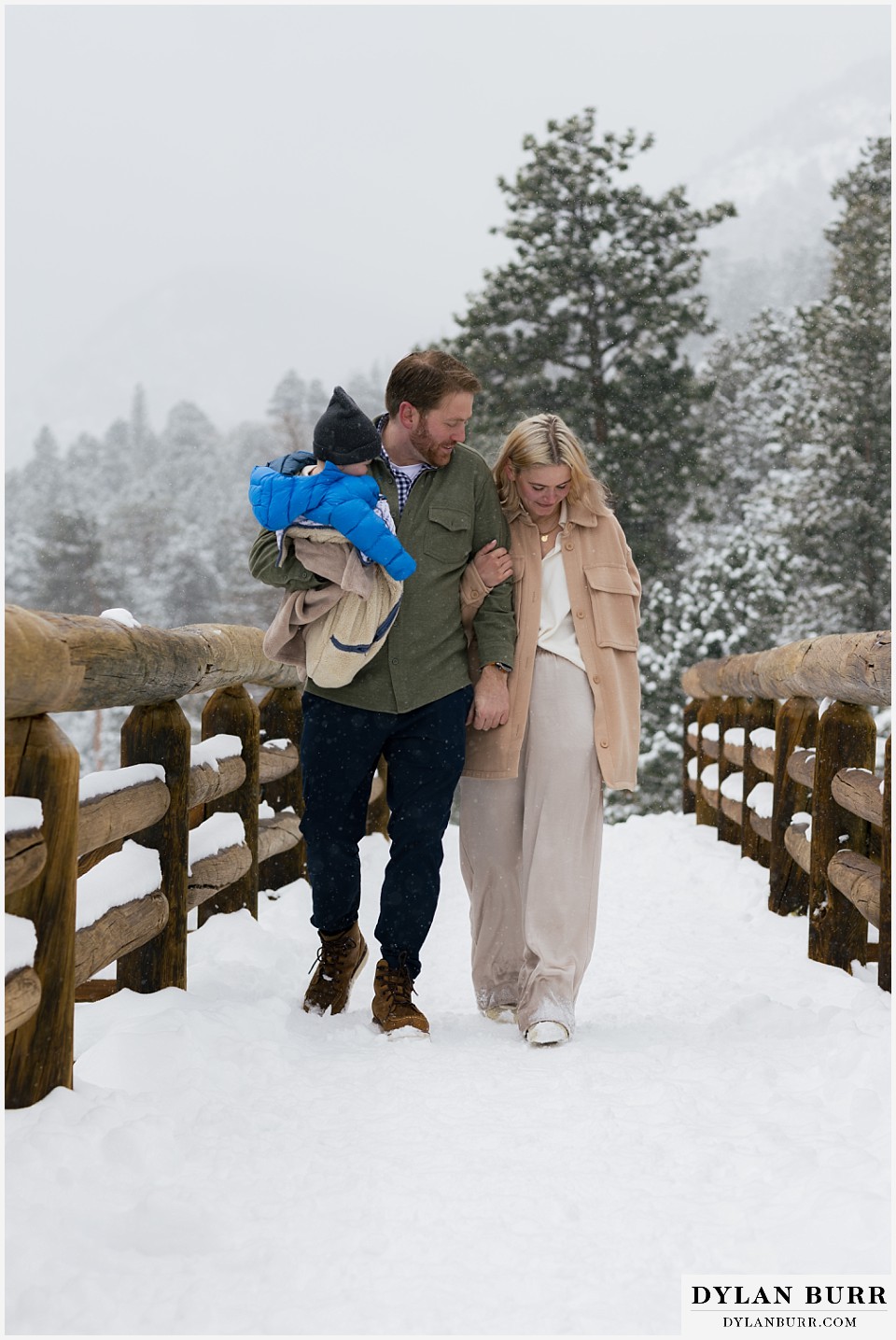 wedding proposal engagement photos walking across bridge together