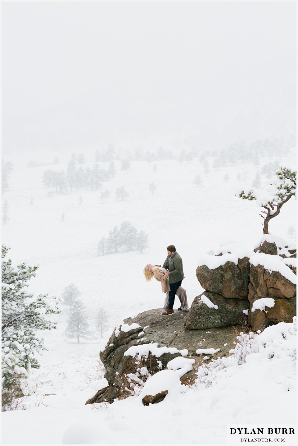 wedding proposal mountain dancing and a dip on a large rock