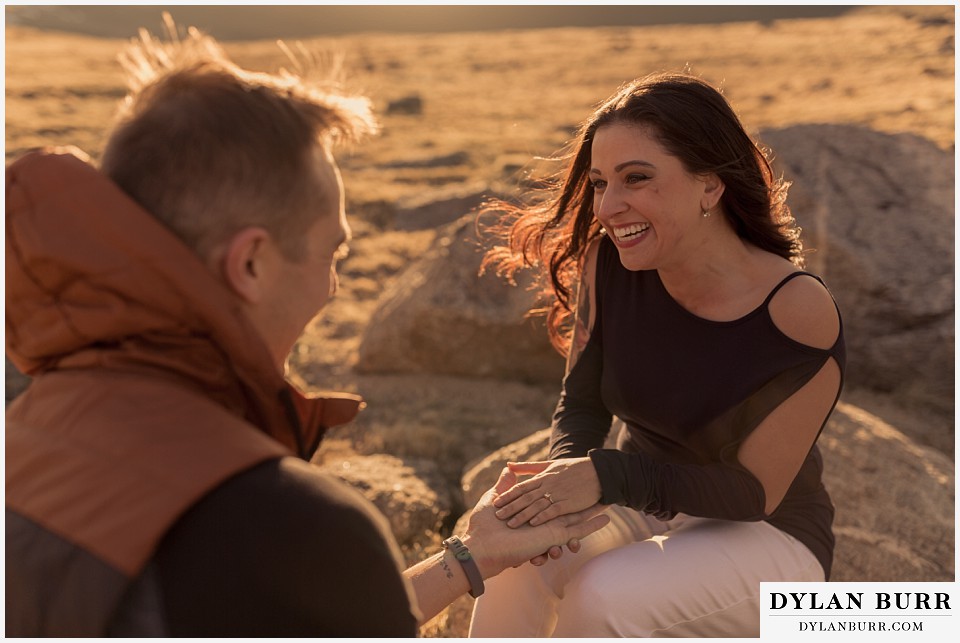 rocky mountain engagement session in colorado laughing together