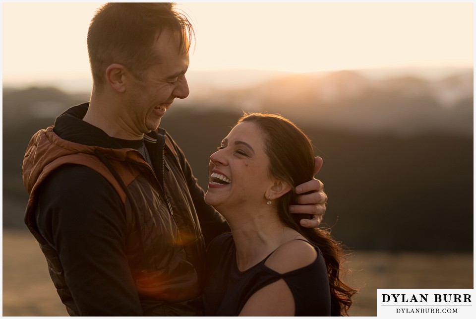rocky mountain engagement session in colorado funny couple laughing