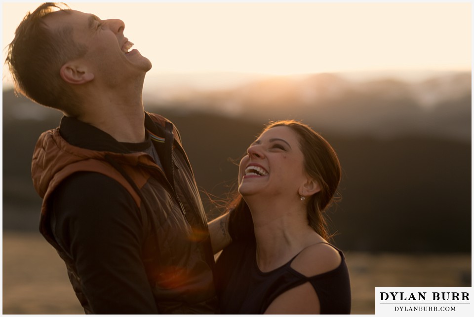 rocky mountain engagement session in colorado hard laughing
