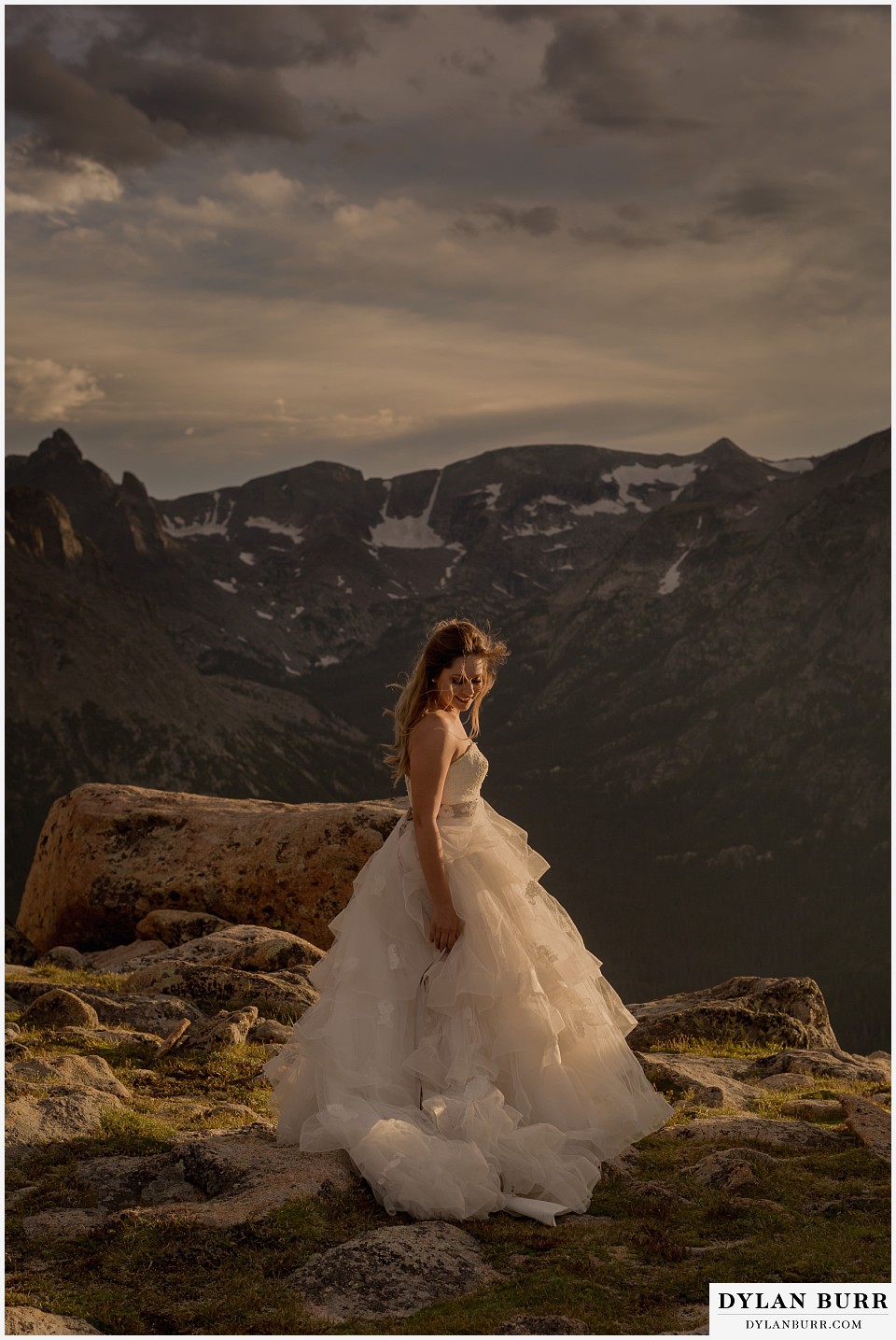 rocky mountain national park elopement adventure wedding bride on mountain top