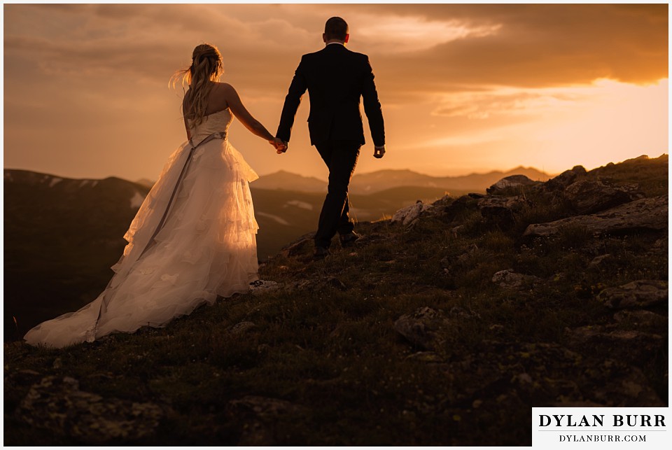 rocky mountain national park elopement adventure wedding walking toward sunset