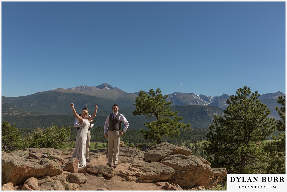 rocky mountain national park wedding elopement bride celebrating in mountains
