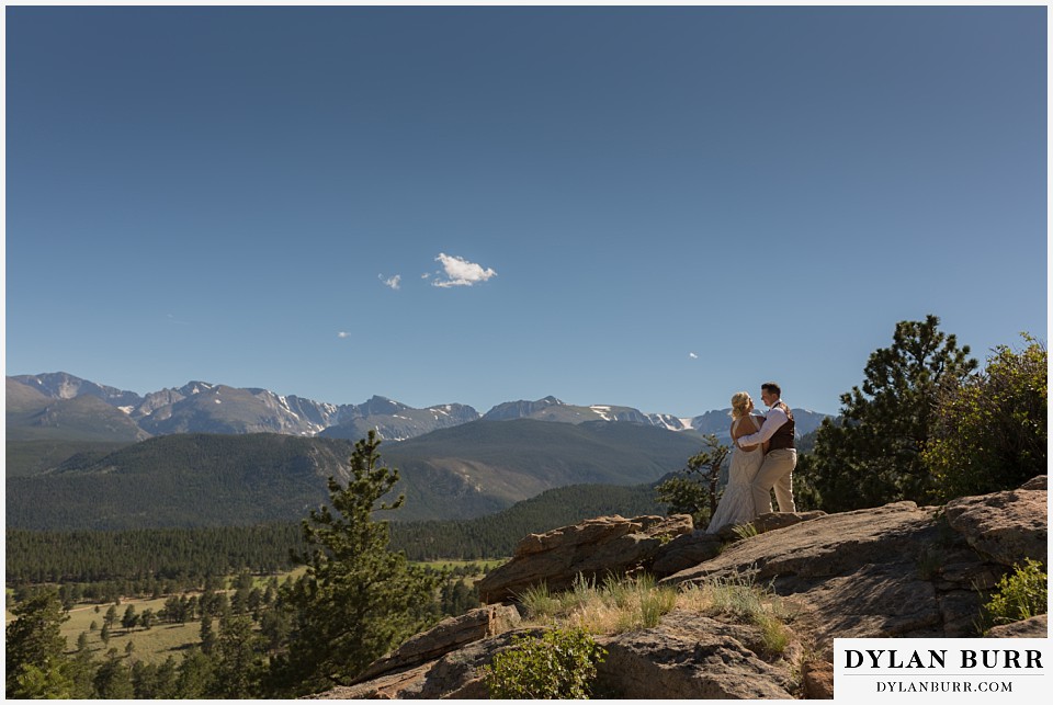 rocky mountain national park wedding elopement bride and groom with huge mountain views
