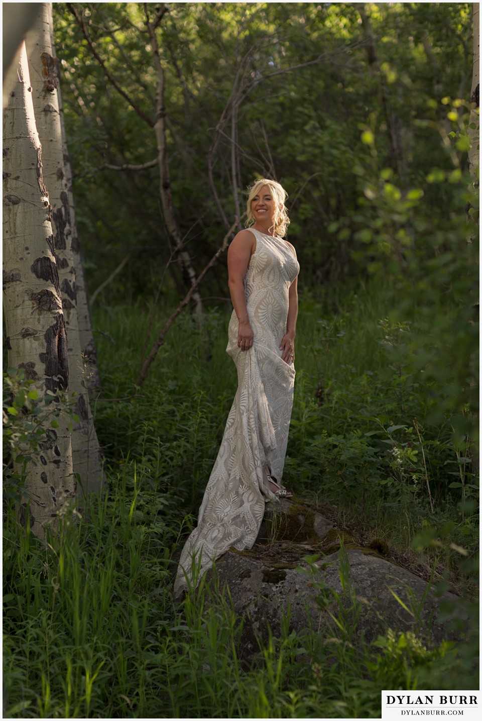 rocky mountain national park wedding elopement gorgeous bride lacy wedding dress in mountains