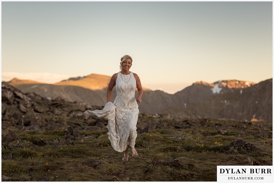 rocky mountain national park wedding elopement bride running on alpine tundra