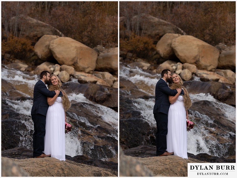rocky mountain national park wedding elopement bride and groom standing near water fall