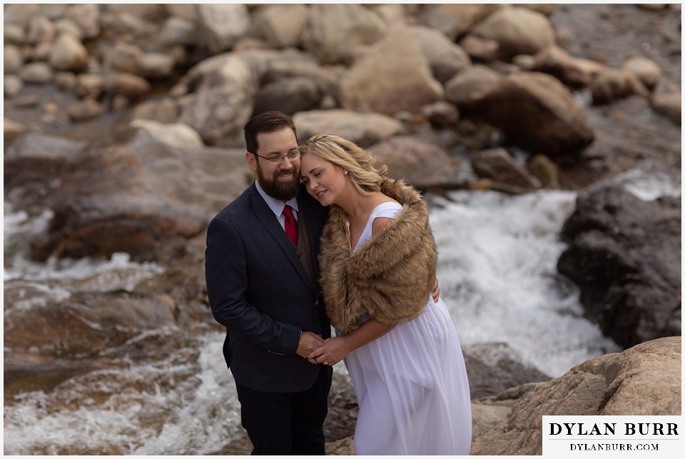 rocky mountain national park wedding elopement bride and groom taking a mintute together