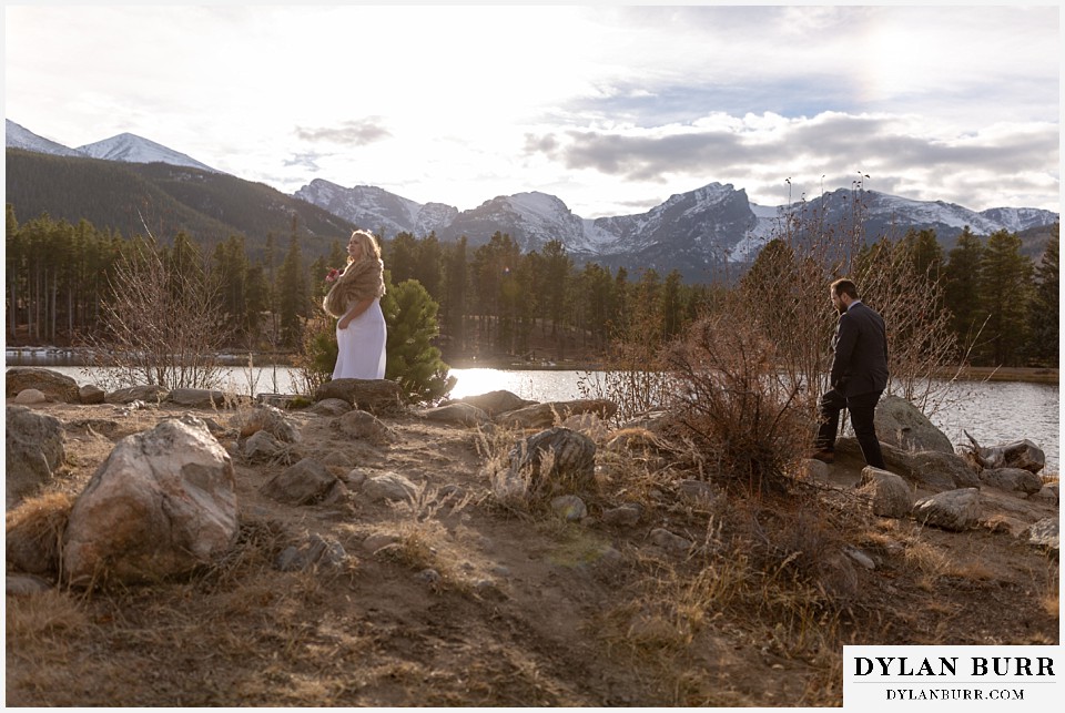 rocky mountain national park wedding elopement bride and groom walking to ceremony site