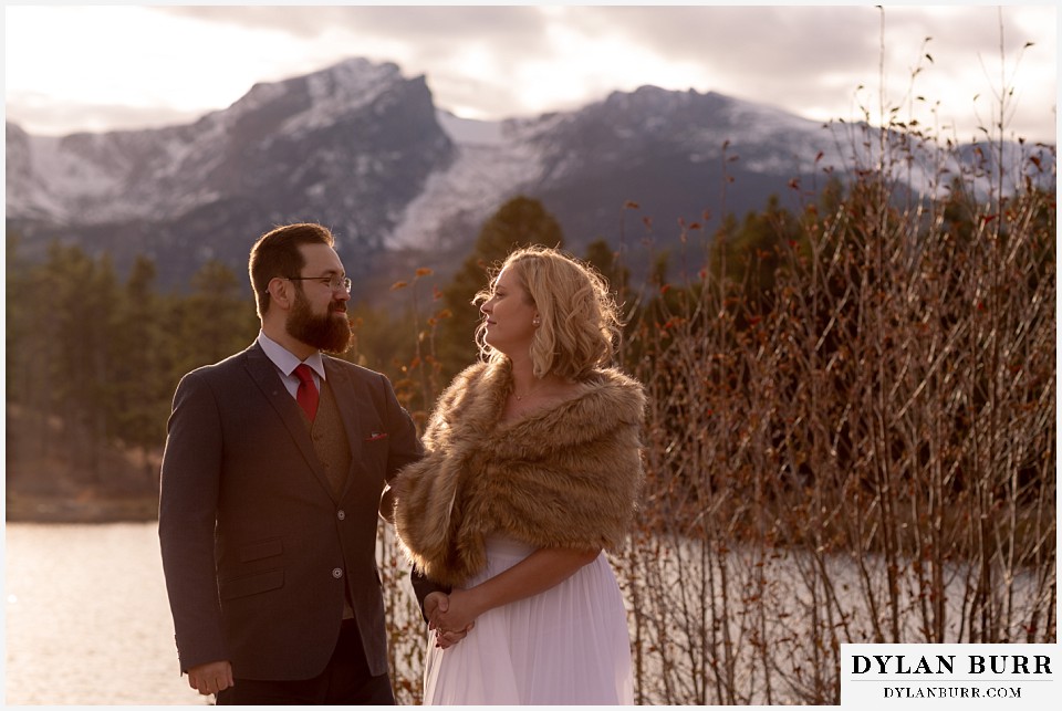 rocky mountain national park wedding elopement bride and groom at sunset in mountains