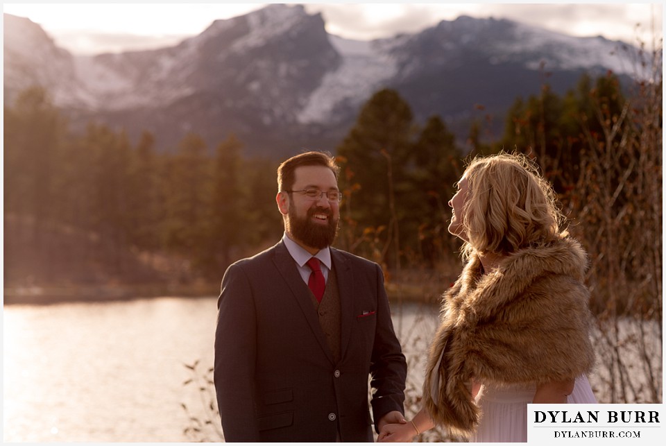 rocky mountain national park wedding elopement bride and groom laughing in mountains