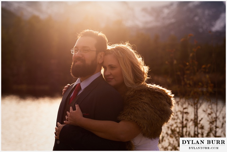 rocky mountain national park wedding elopement bride and groom standing together at sunset