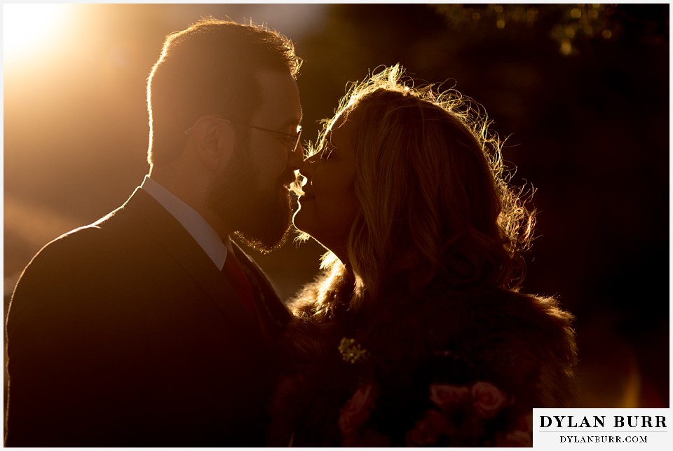 rocky mountain national park wedding elopement bride and groom in sunset glow