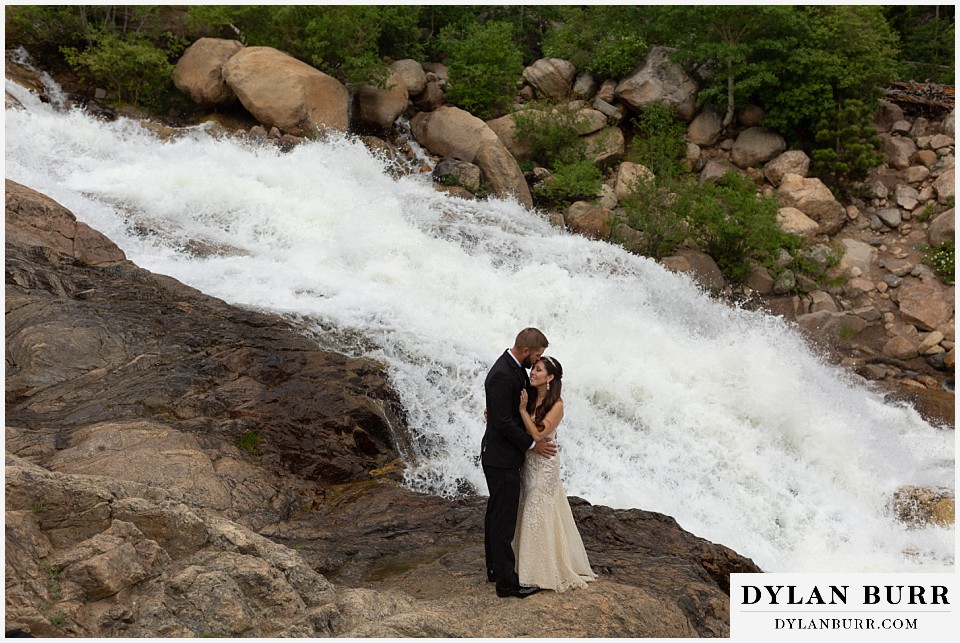 rocky mountain national park wedding elopement colorado wedding photographer dylan burr groom kissing bride on forehead