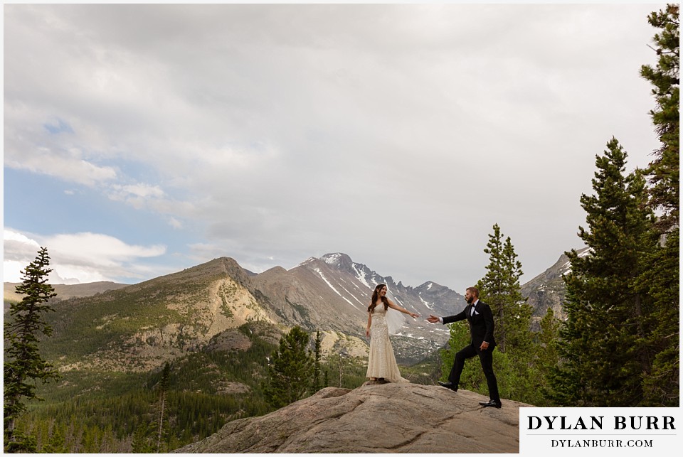 rocky mountain national park wedding elopement colorado wedding photographer dylan burr groom walking up to bride