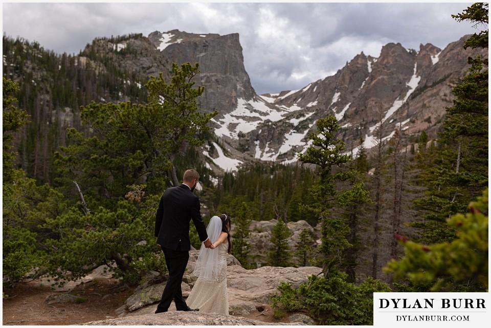 rocky mountain national park wedding elopement colorado wedding photographer dylan burr bride and groom hiking towards Hallet Peak