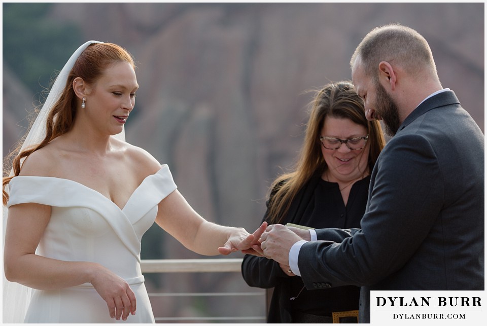 roxborough state park elopement wedding exchanging rings