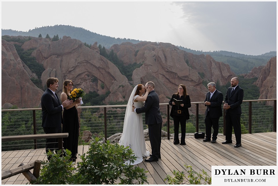 roxborough state park elopement wedding first kiss