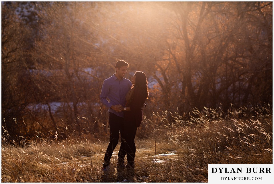 roxborough state park engagement photo session couple spending time together at sunset