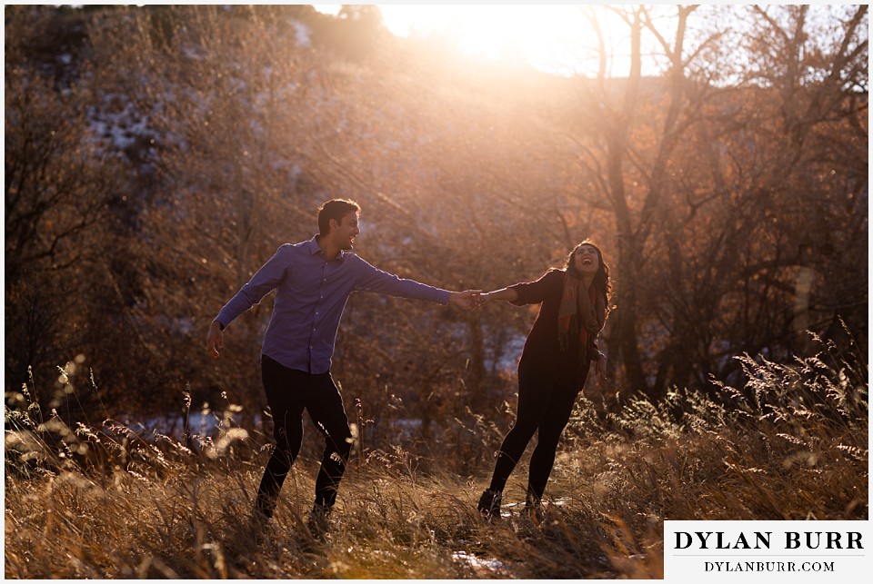 roxborough state park engagement photo session couple dancing and being silly