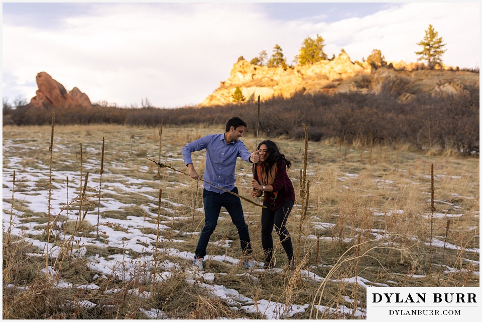 roxborough state park engagement photo session cheating during a cattail fight
