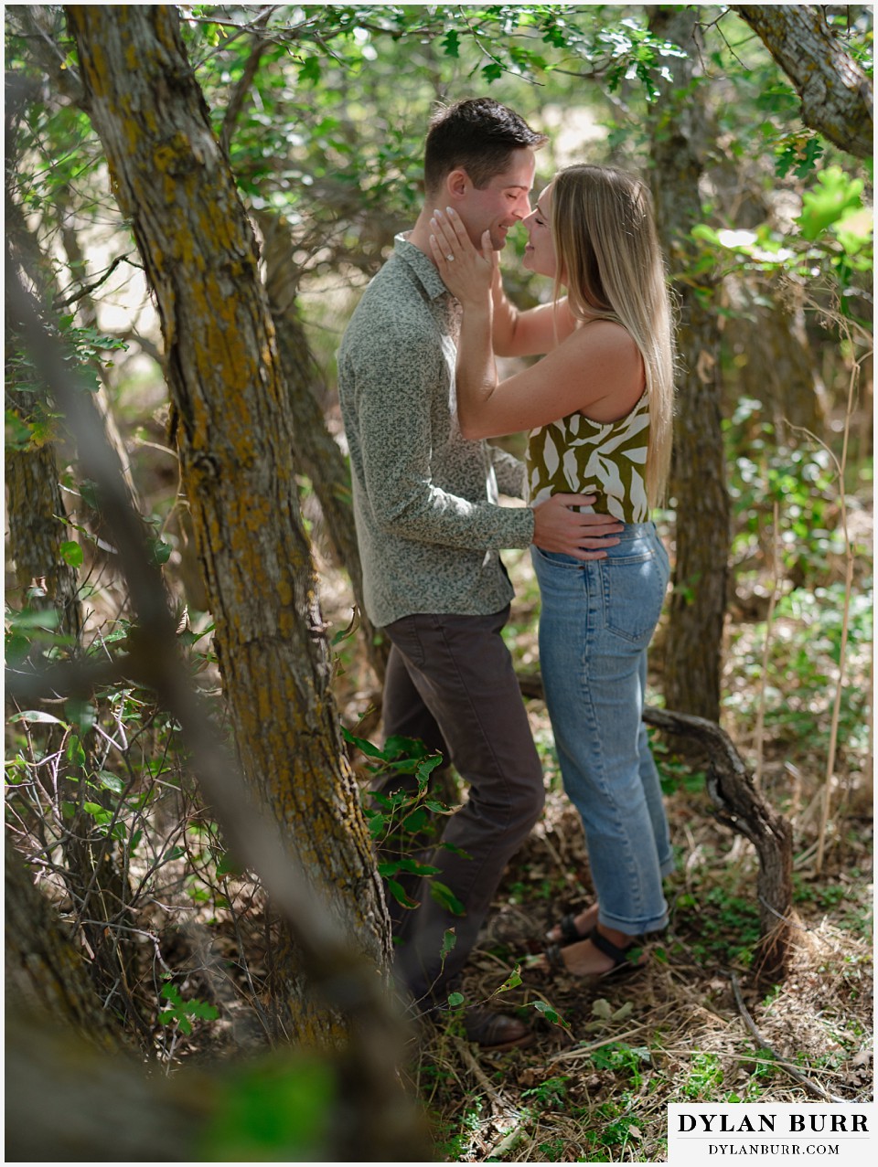 proposal in roxborough state park kissing in trees