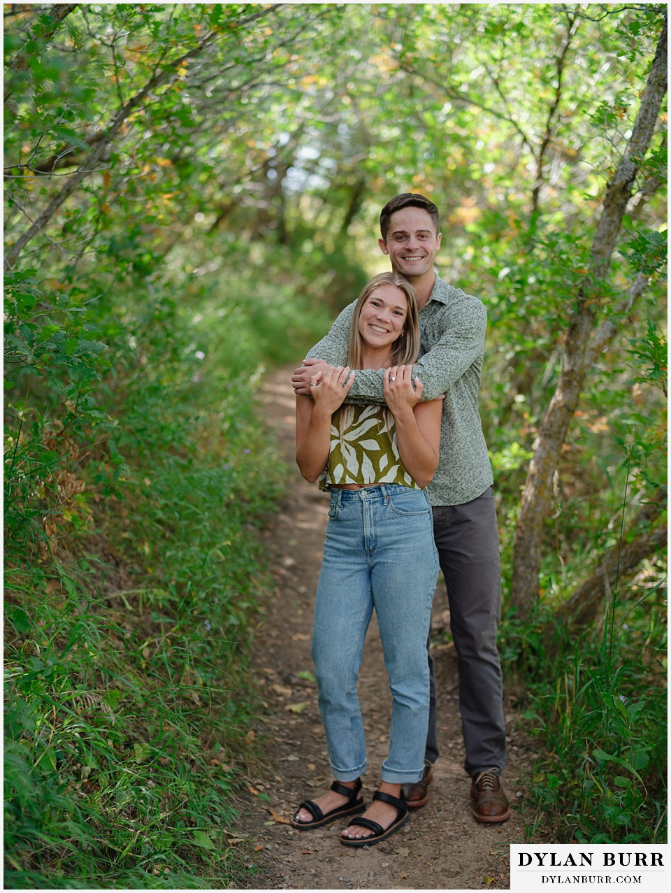 proposal in roxborough state park posing together in oak trees