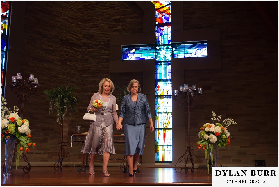 sanctuary golf course wedding moms lighting candles together