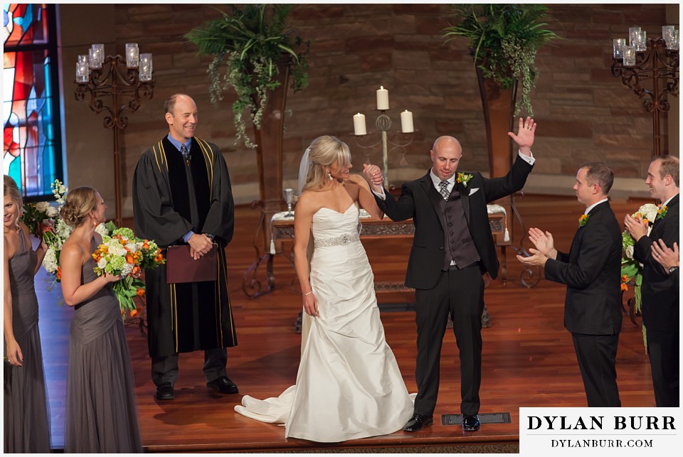 sanctuary golf course wedding bride and groom celebrating