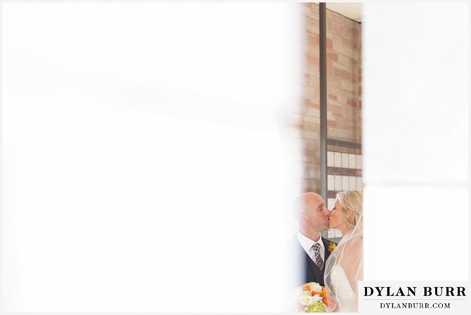 sanctuary golf course wedding kissing in a sliver