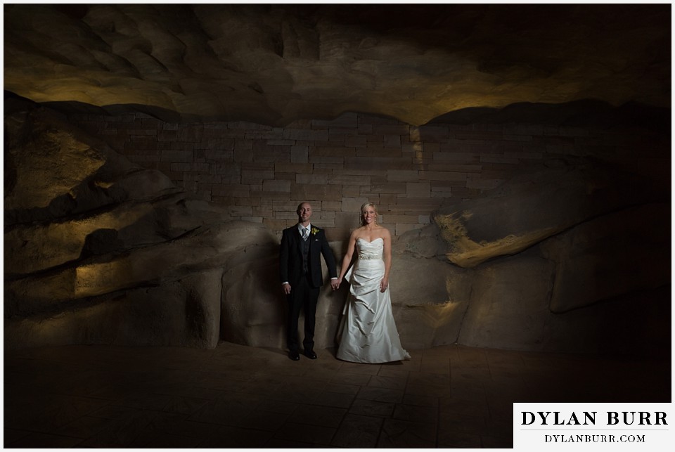sanctuary golf course wedding bride and groom standing near rock walk