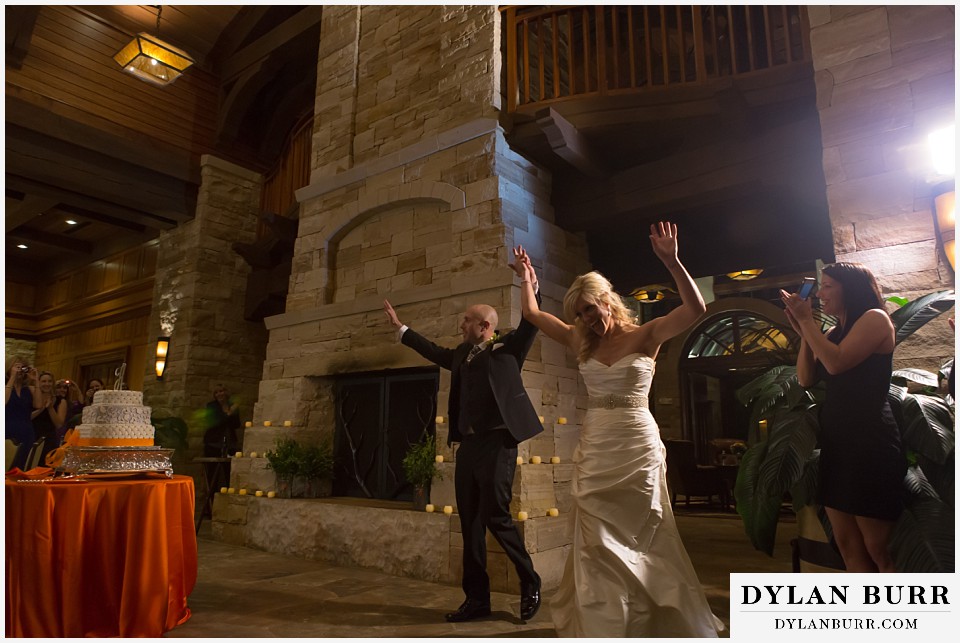 sanctuary golf course wedding bride and groom walking into reception