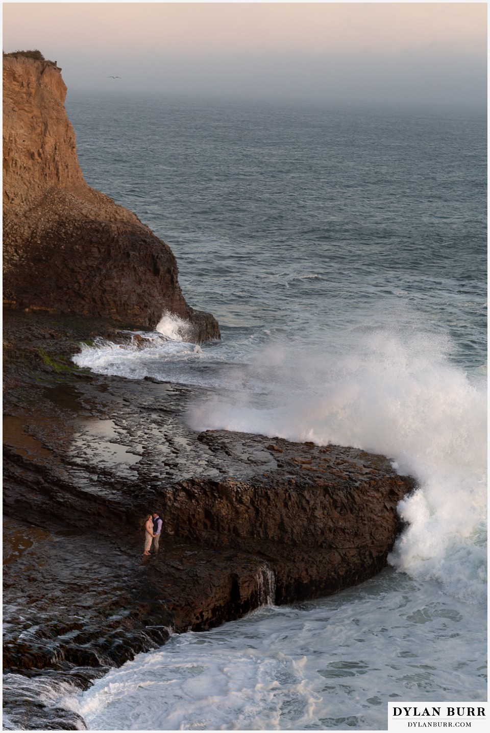 santa cruz california elopement wedding adventure bride and groom together giant cliffs surrounding them