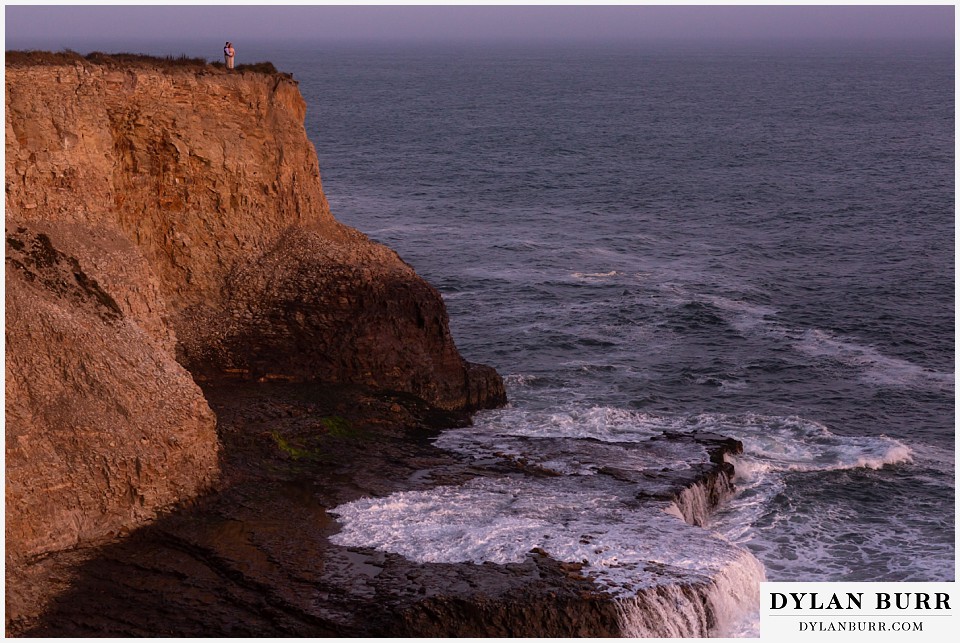 santa cruz california elopement wedding adventure bride and groom on top of cliffs wide panoramic portrait