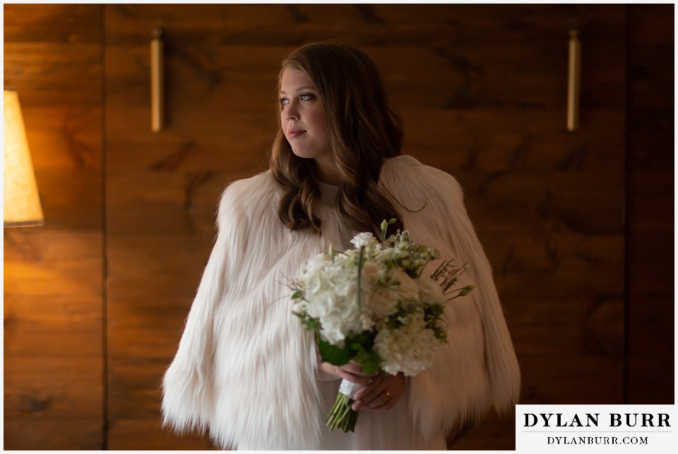 sonnenalp vail wedding bride all ready and looking out window