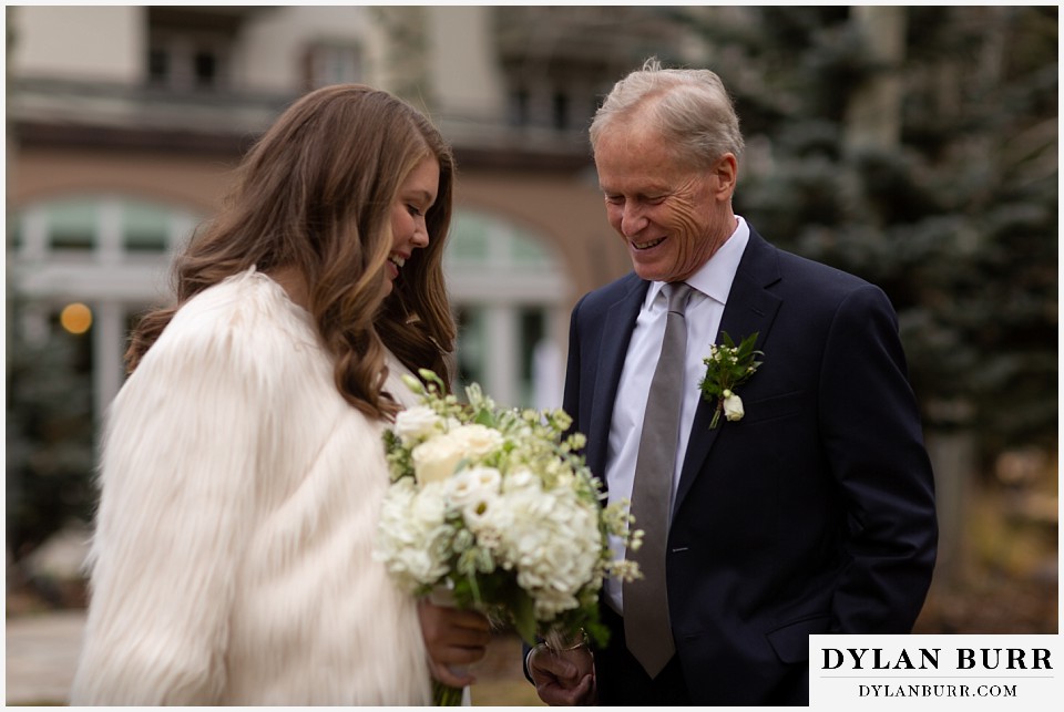 sonnenalp vail wedding daughter and father standing together smiling