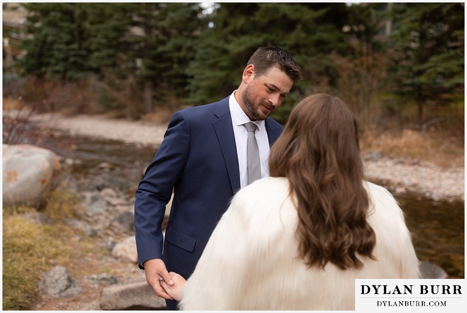 sonnenalp vail wedding first look groom looking at bride to be