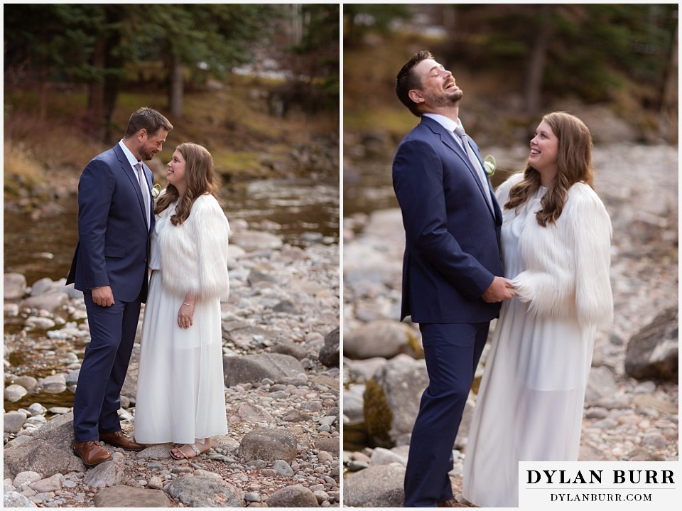 sonnenalp vail wedding bride and groom laughing together by the riverside