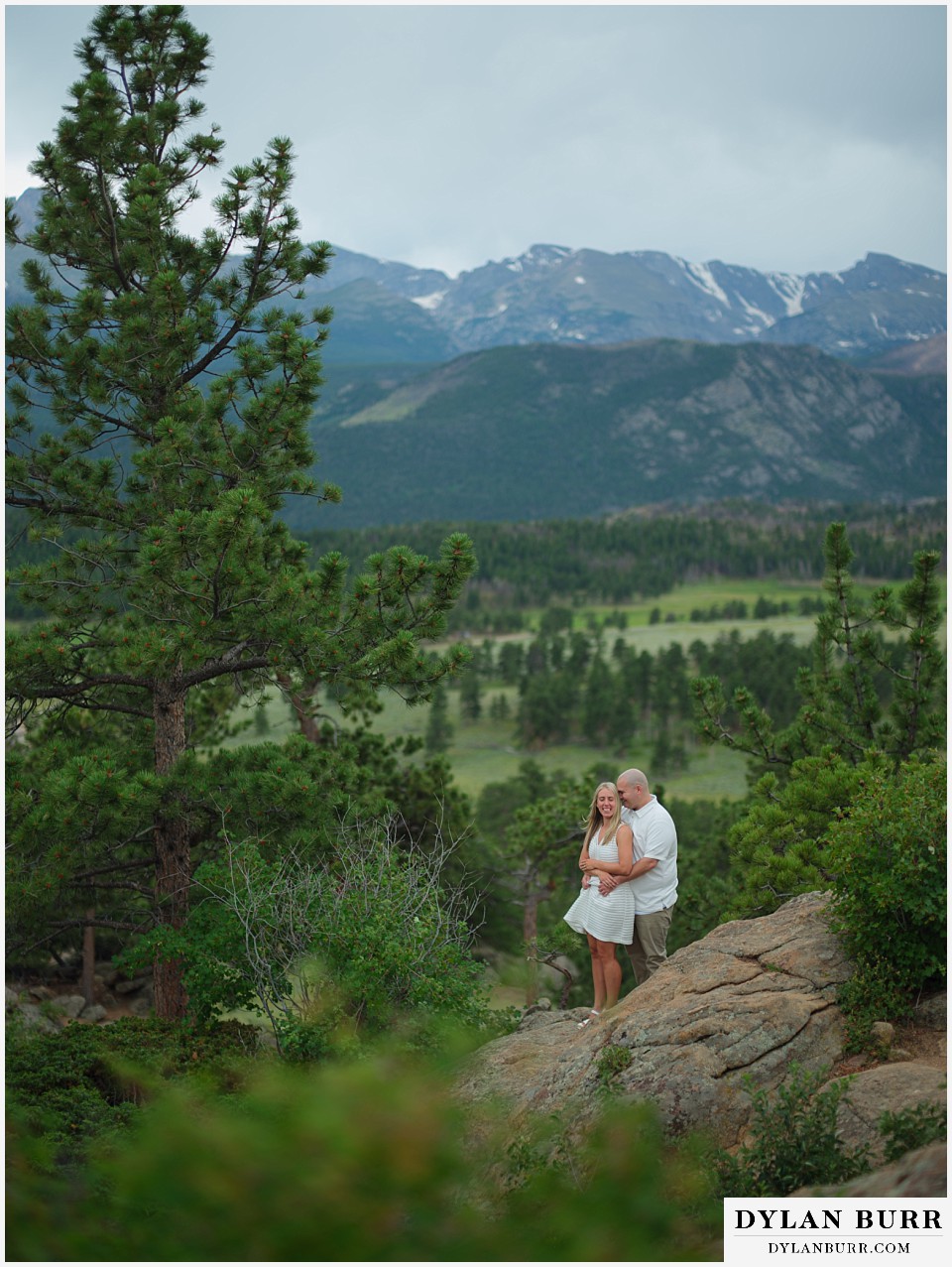 couple together in mountains during spring