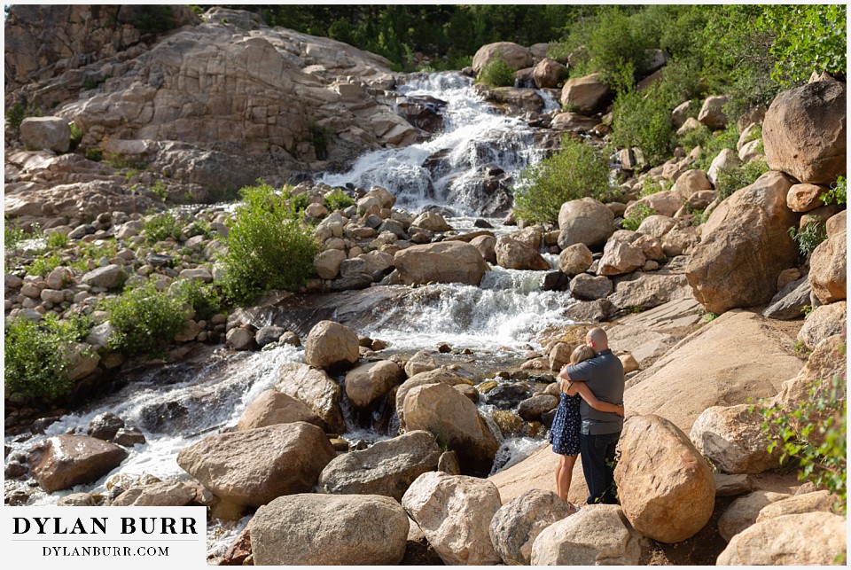 spring engagement photo session in the mountains at waterfall