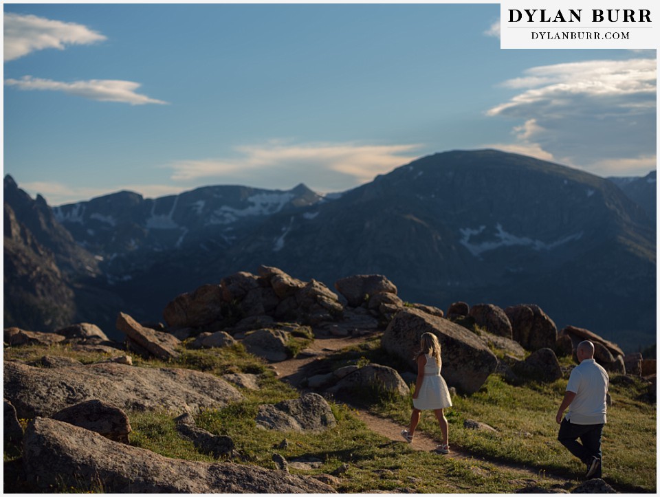 spring engagement photo session in the mountains couple on mountain trail