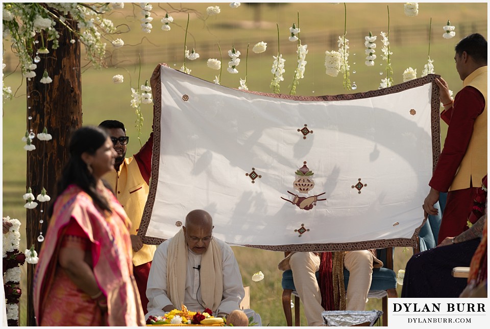 spruce mountain ranch wedding indian wedding grooms view blocked of bride