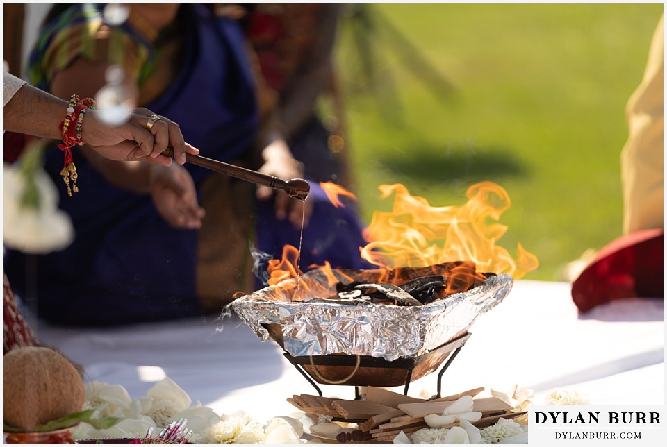 spruce mountain ranch wedding indian wedding ceremony offering fire