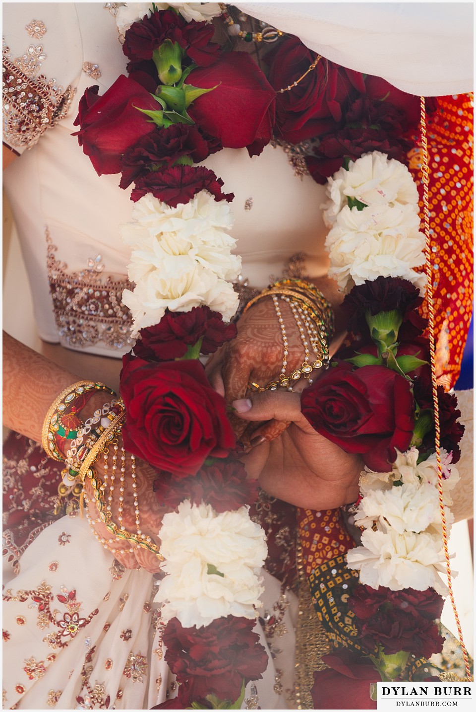 spruce mountain ranch wedding indian wedding bride and groom holding hands